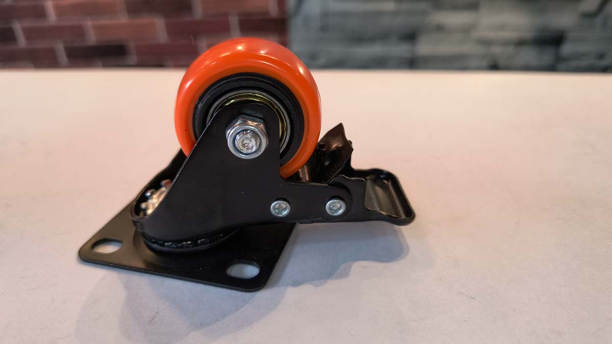 Rodachina 1.1/2" con freno naranja